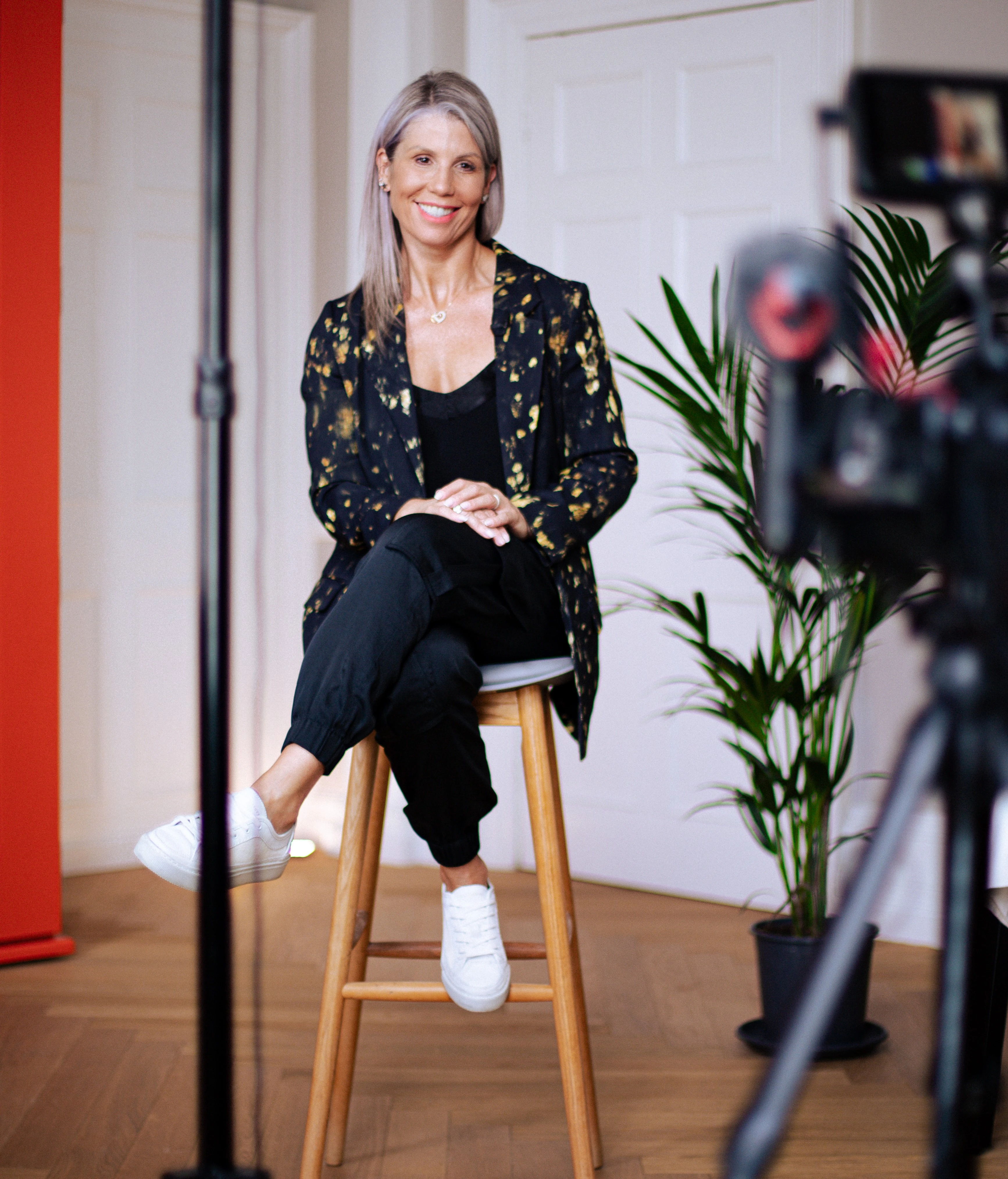 Donna Owen on stool Donna Owen on stool