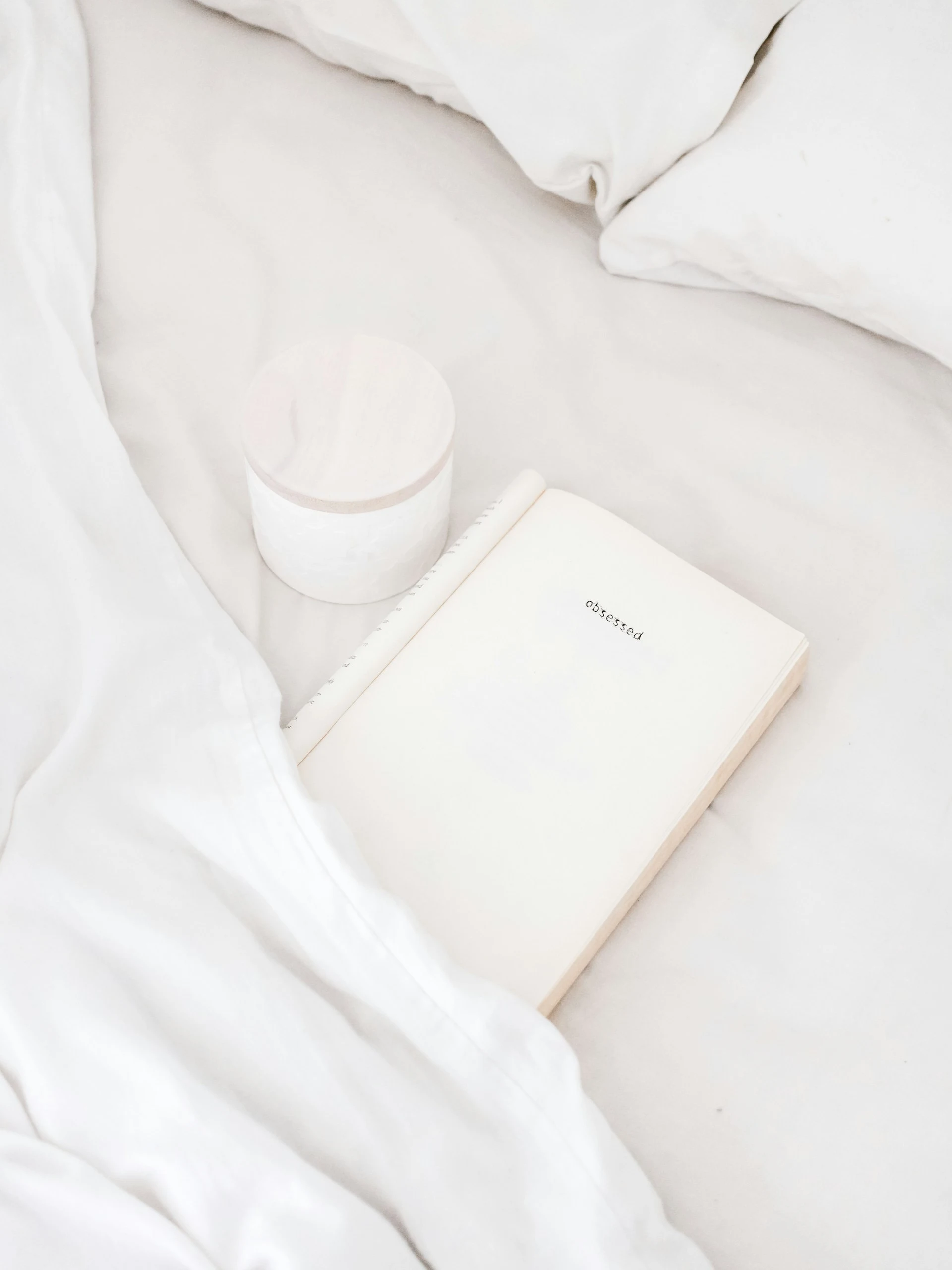 Notepad on bed Notepad on bed