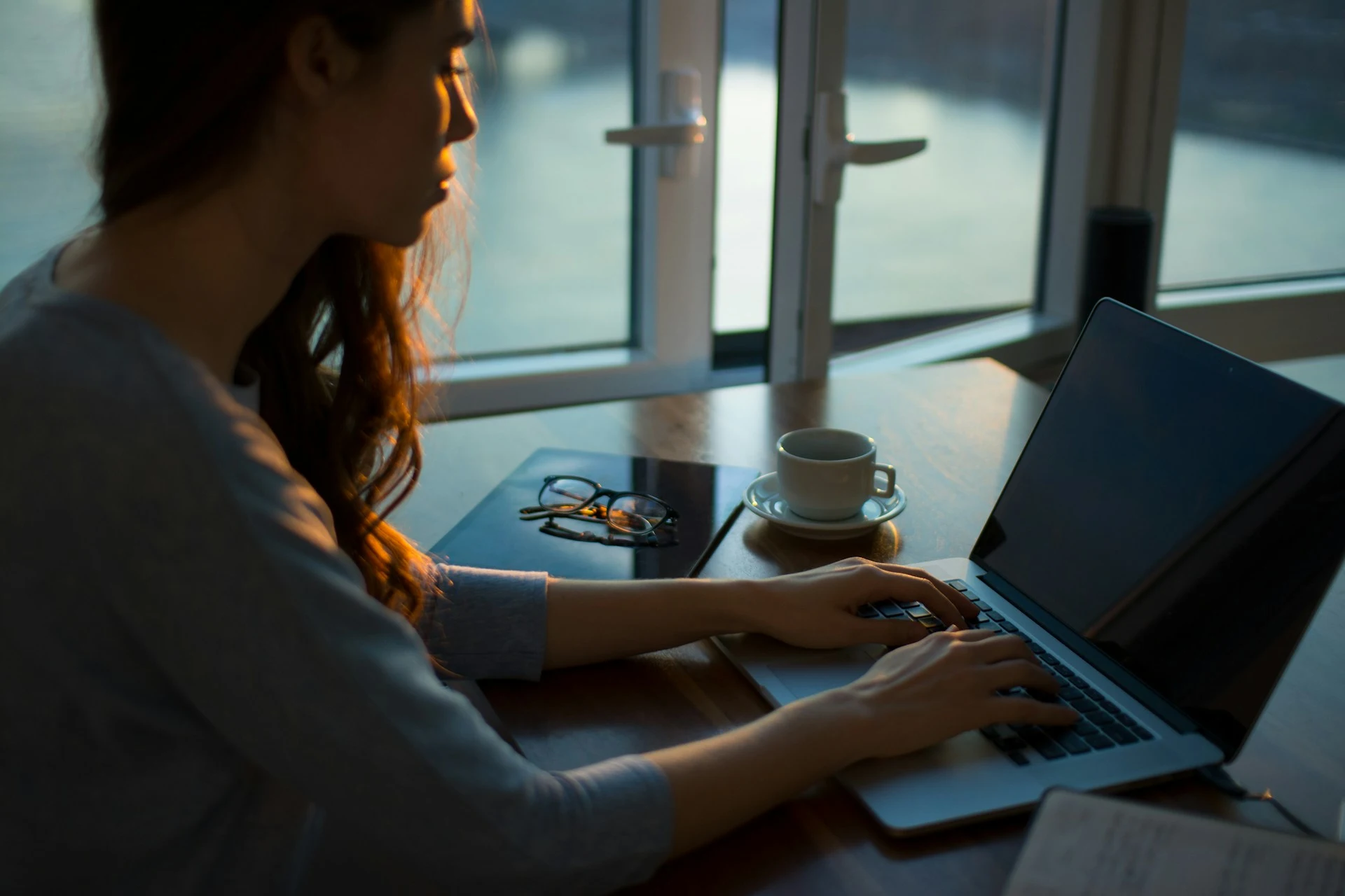 Woman sitting at laptop Woman sitting at laptop